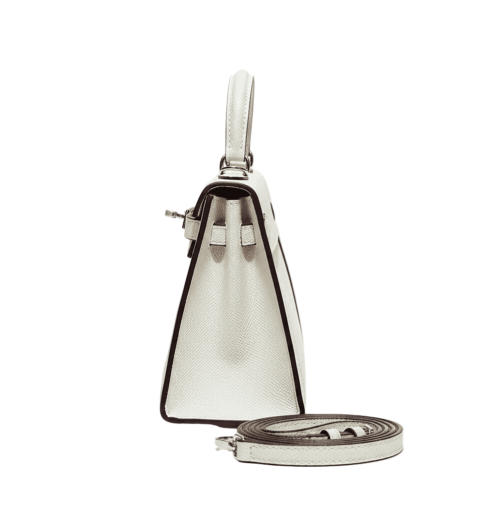 Designer handbag with a detachable strap on a white background