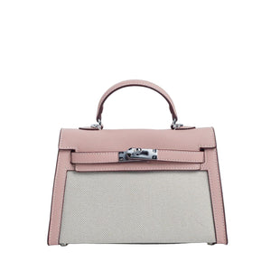 Pink handbag with a silver clasp on a light gray background