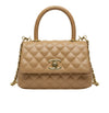 Chanel | Mini Coco Handle Flap Bag In Caramel/beige Caviar Leather.